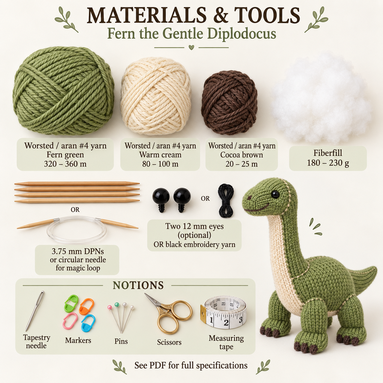 Materials and tools arranged beside the finished project for the diplodocus knitting pattern.
